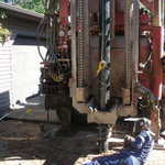 Welding next length of well casing.