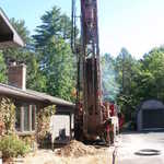 Containing well cuttings/debris to work area.